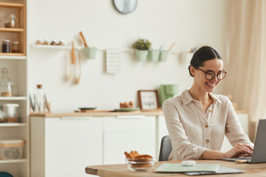 Smiling Young Woman Working from Home